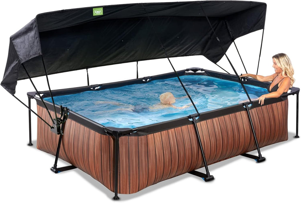 EXIT Toys Wood Pool con Toldo Solar - 300x200x65cm - Piscina de Marco Rectangular Compacta con Bomba de Filtro de Cartucho - Protección UV Óptima - Fácil Acceso - Diseño Único - Marrón